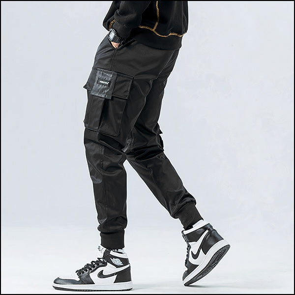 Pantalon cargo satiné noir