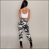 Pantalon camouflage blanc femme