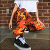 Pantalon camouflage femme orange
