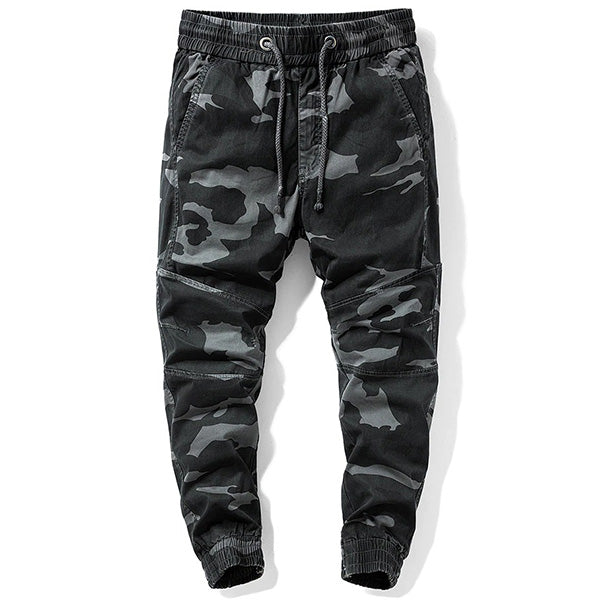 https://www.boutique-militaire.fr/cdn/shop/products/pantalon-style-treillis-camouflage-gris-homme-boutique-militaire_600x600.jpg?v=1649360479