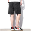 Short camouflage homme noir